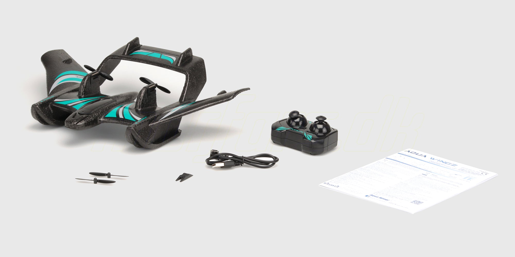 Aqua Wingz med sender, ladekabel, reservepropeller og manual