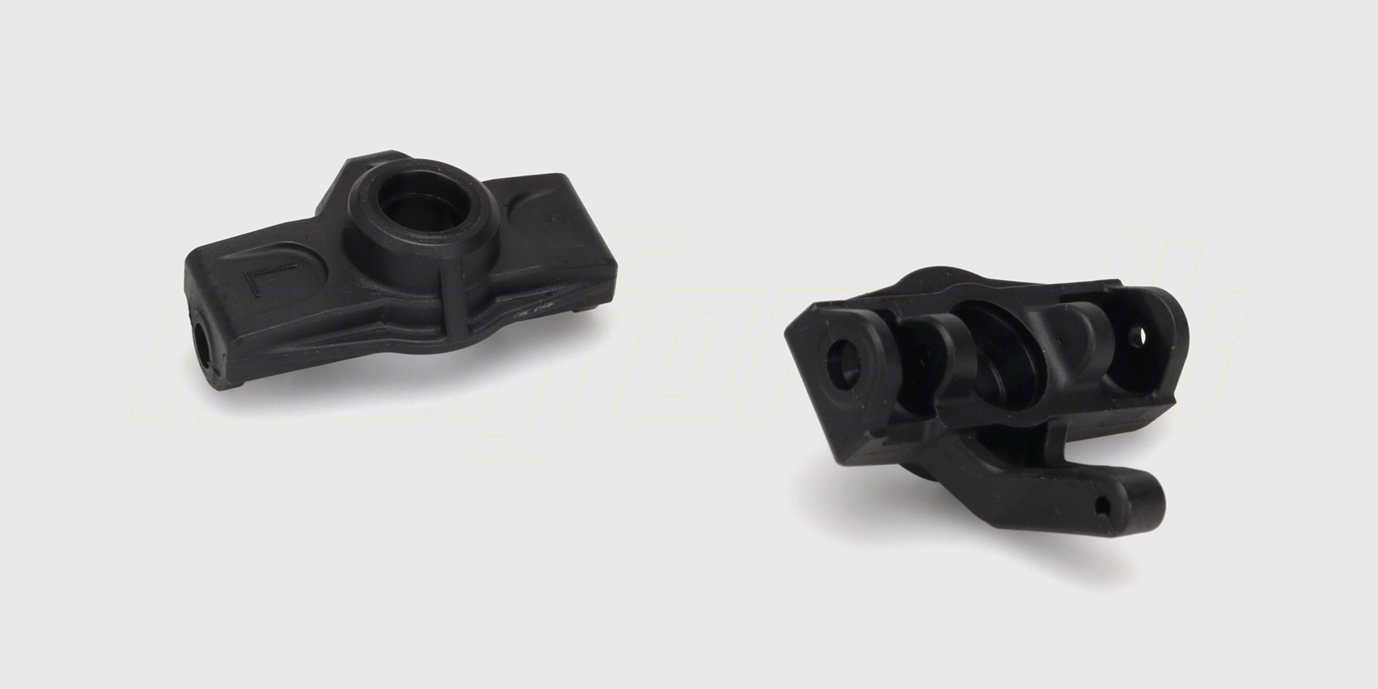 To sorte Tornado steering hubs styrespindler i plast til HBX fjernstyret bil vist på hvid baggrund.
