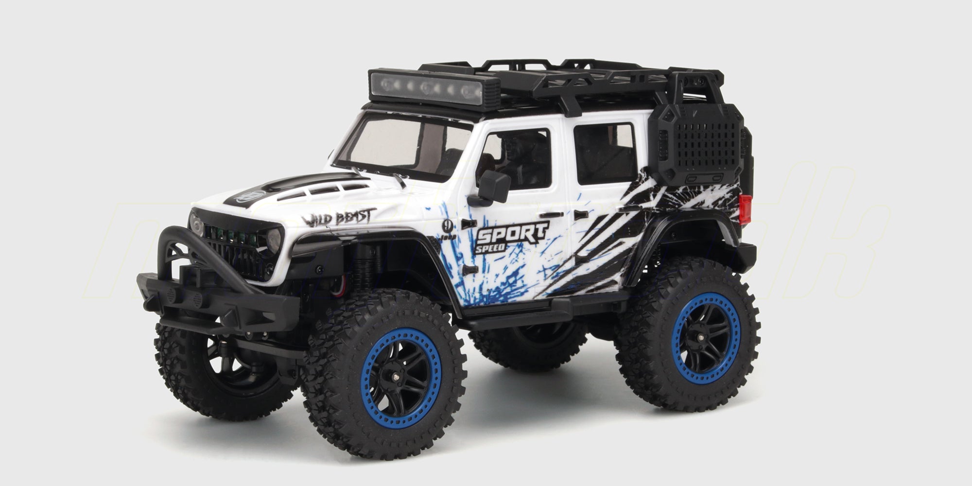 Grøn Wild Beast Mini Crawler fjernstyret bil med LED-lys på taget vist skråt forfra på hvid baggrund.