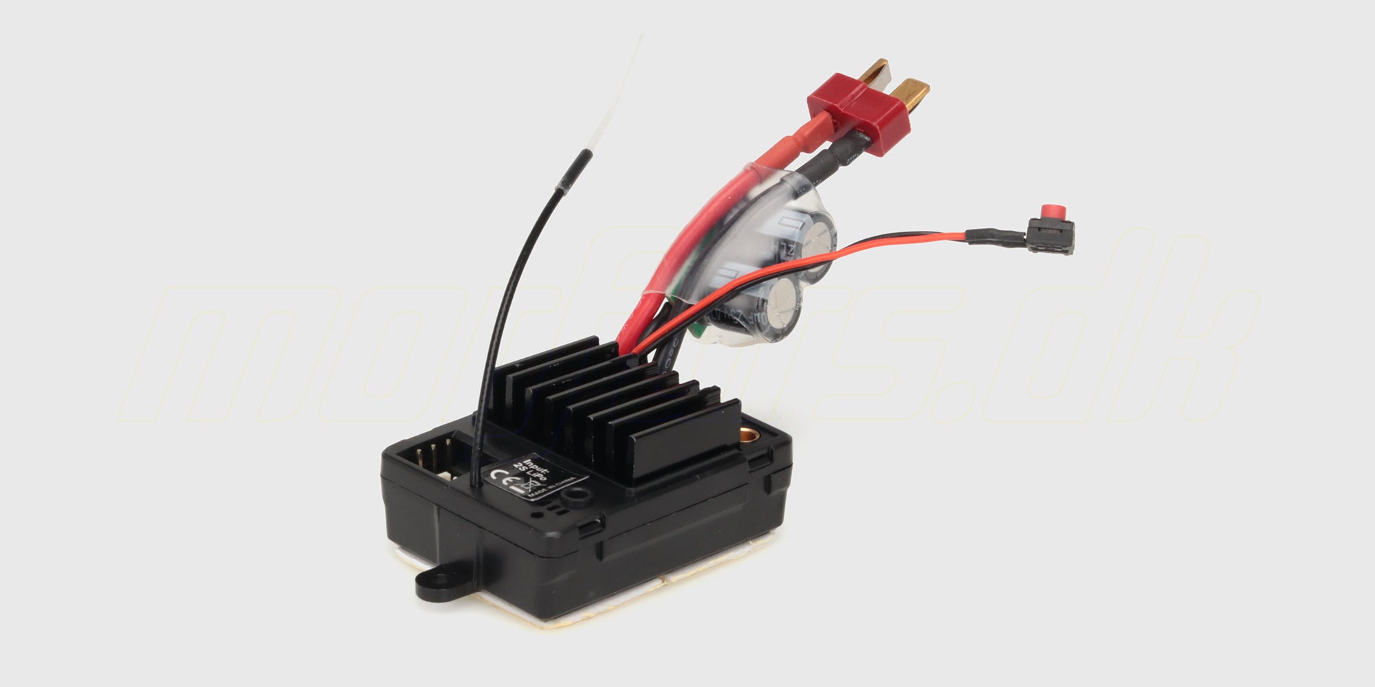 Sort Tornado brushless ESC og receiver enhed til fjernstyret bil med farvede ledninger og køleribber.