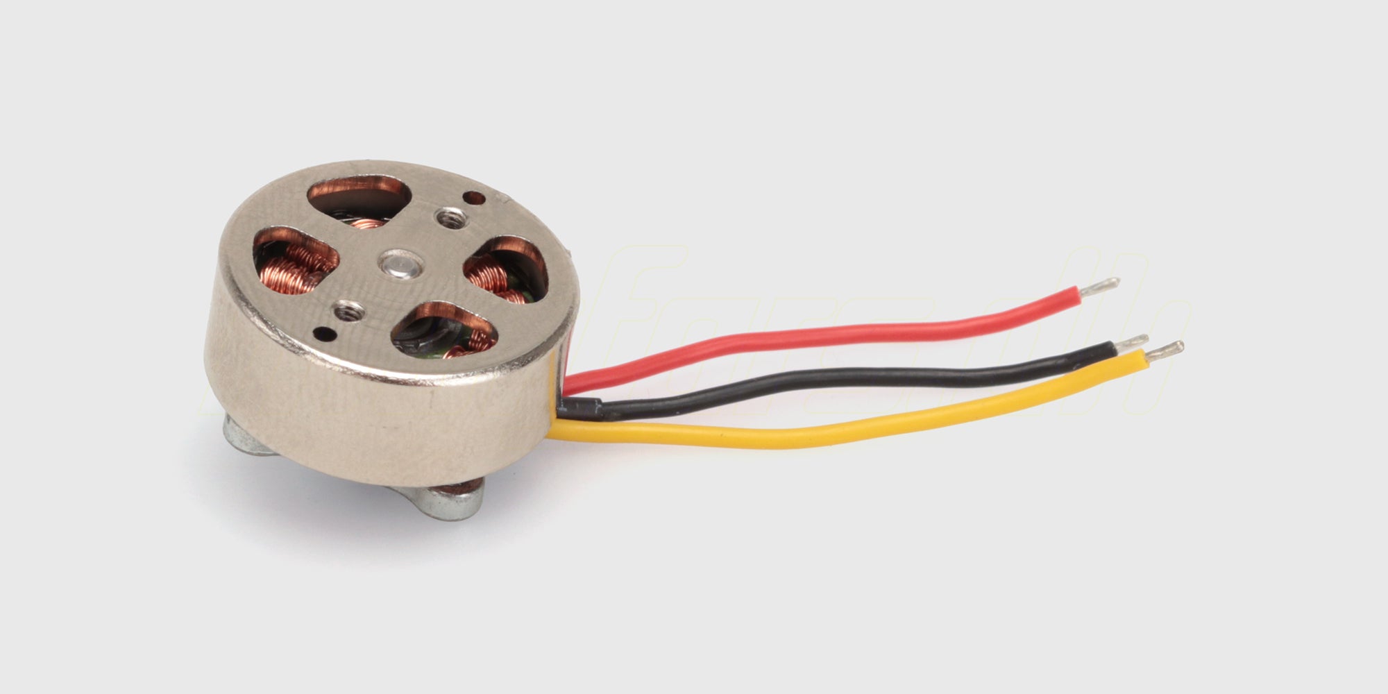 Kraftfuld elmotor til STX8B fjernstyret bil med sølvfarvet metalhus og monteringsledninger.