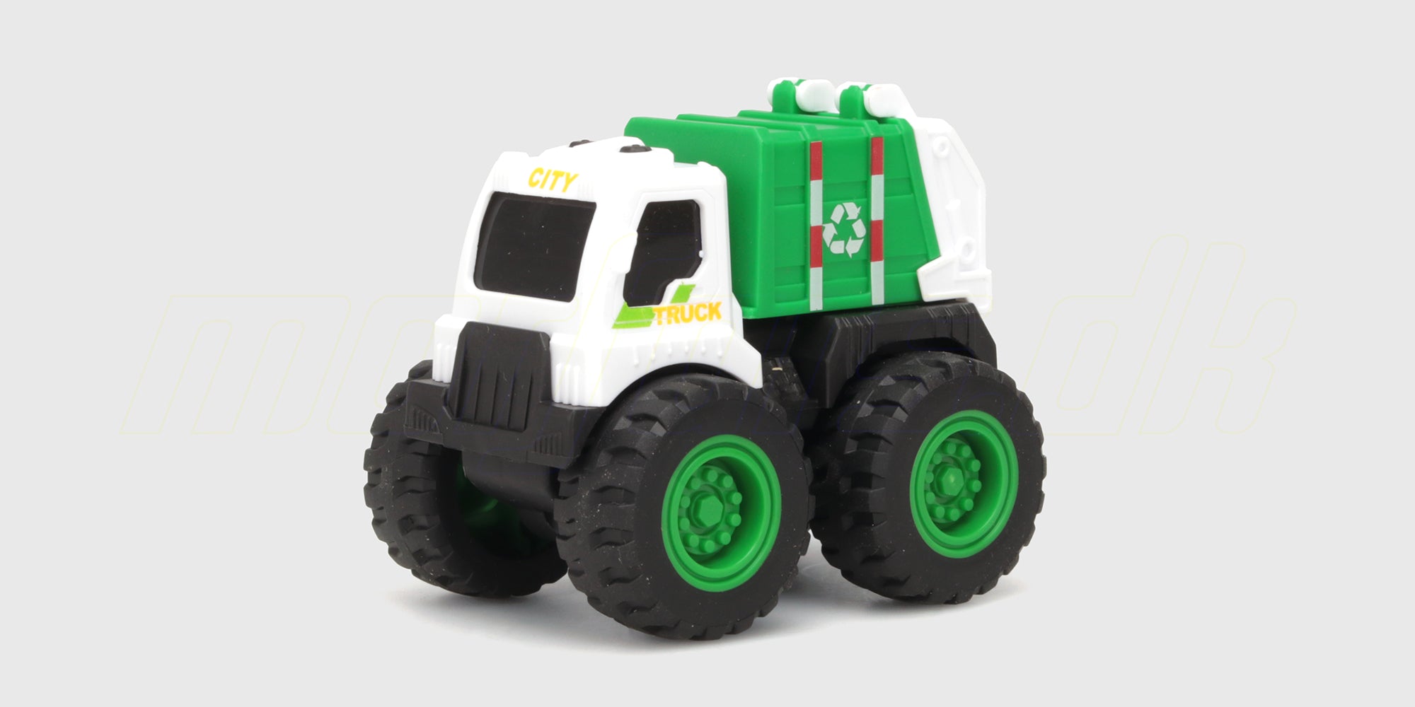 Grøn Micro Monster friktionsbil med store hjul og farverige detaljer til børn.